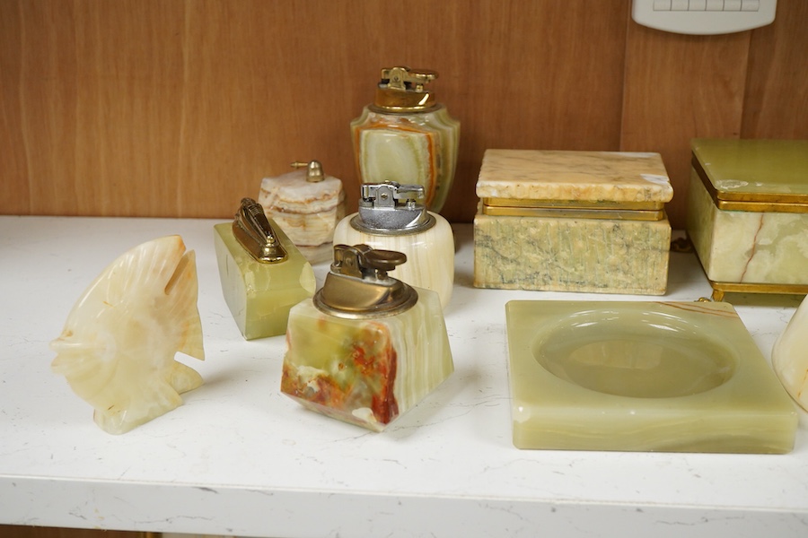 A collection of various onyx collectables to include boxes, vases and table lighters, largest 23cm high